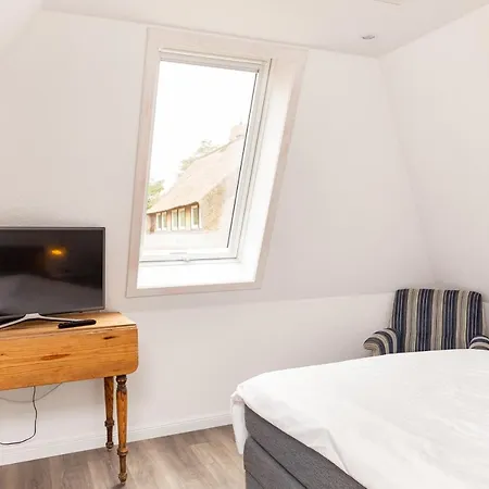 Hébergement de vacances Kleine Haus - Reetdachhaus Petersen Nebel